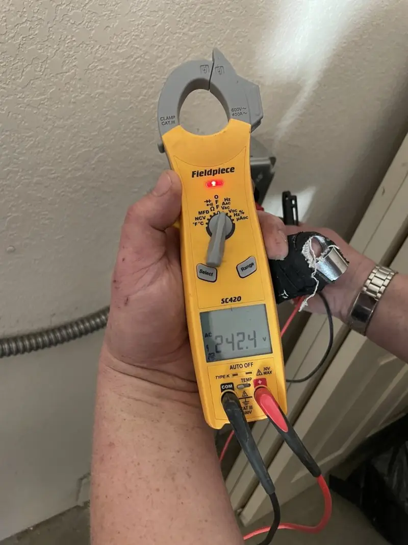 Voltage testing with clamp meter during Electrical Installation Services in North Fair Oaks